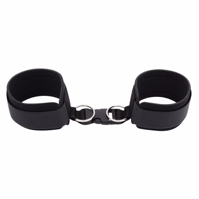 A pair of black shackles made of diving material and webbing.