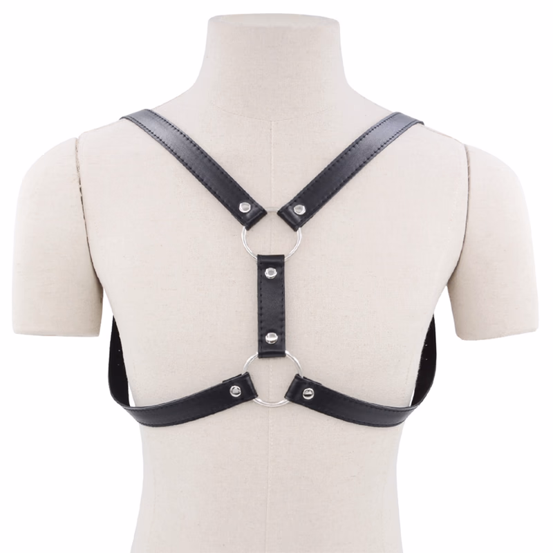 The muscular man wore PU leather clothing, a form of restraint, in black.