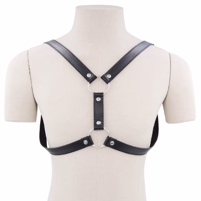 The muscular man wore PU leather clothing, a form of restraint, in black.