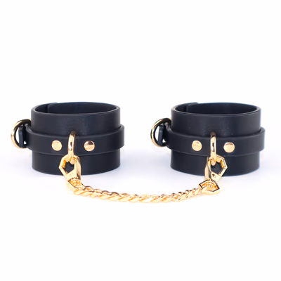 Leather handcuffs with gold chains