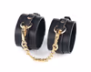Leather handcuffs with gold chains