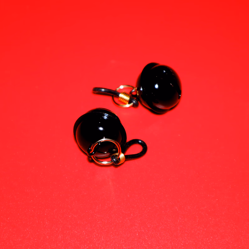 Black bell nipple clamps