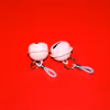 Pink bell nipple clamps