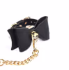 Black choker with gold chain