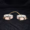 Pink diamond handcuffs with gold chains