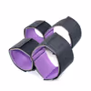 SM bondage handcuffs, black and purple restraint straps