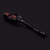 Black handle with red wolf-tooth scroll wheel