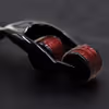 Black handle with red wolf-tooth scroll wheel
