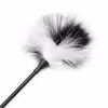 Black and white feathers plus black racket