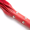 Red seven-studded leather whip