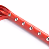 Red seven-studded leather whip