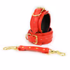 Red handcuffs, leg irons
