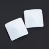 Square-shaped white metal nipple covers