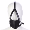 Black leather gag with solid soft ball, leather saddlebags.