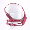Leather gag for harnesses, black solid soft ball, rose red leather