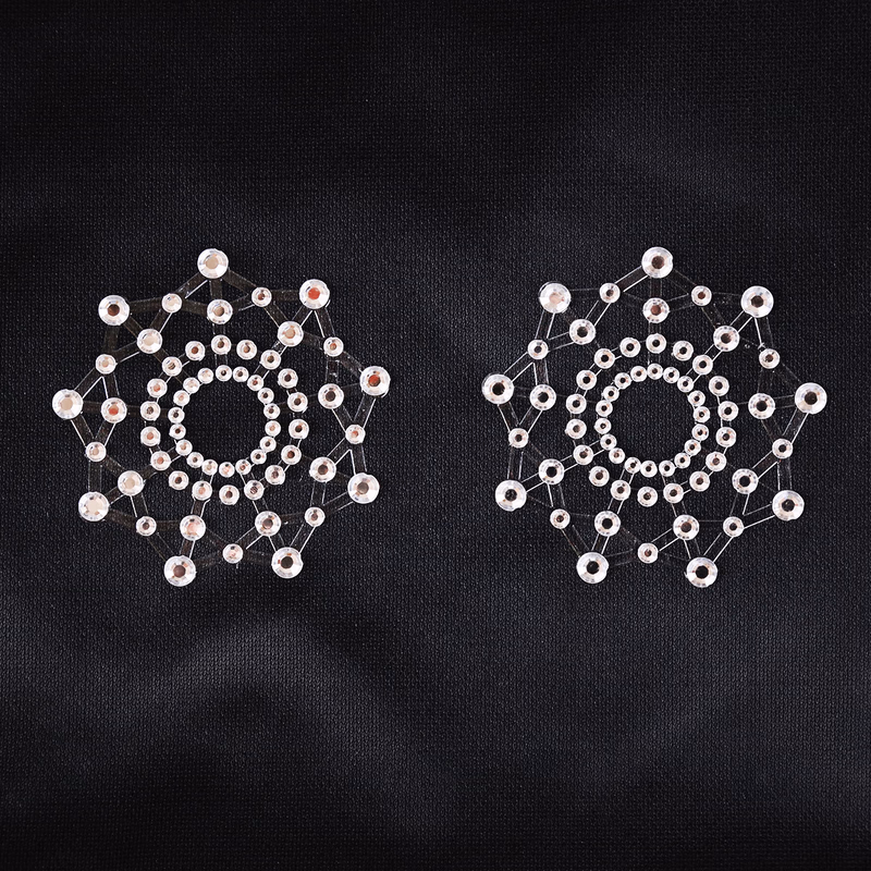 White, round, self-adhesive nipple covers