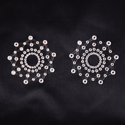 White, round, self-adhesive nipple covers