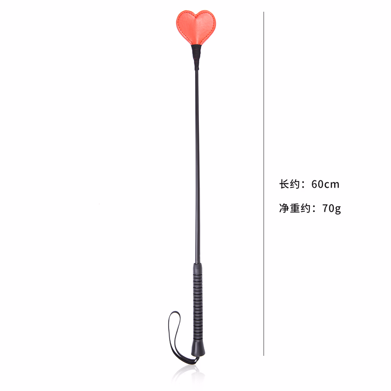 Rubber-handled red heart-shaped leather whip