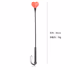 Rubber-handled red heart-shaped leather whip