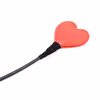 Rubber-handled red heart-shaped leather whip