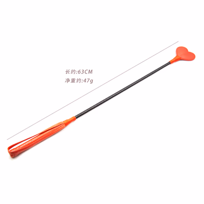 Red heart-shaped leather whip with red wrap handle