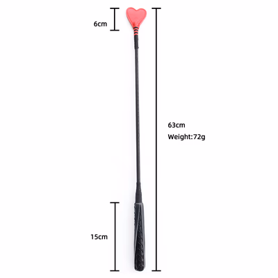 Red heart-shaped leather whip with black woven handle