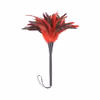 Trumpet-shaped flowers with black and red feathers