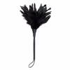 Trumpet-shaped flowers with all-black feathers