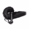 A fluffy tail with a black whip
