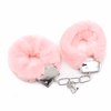 Pink three-piece set of handcuffs, whip, and blindfold