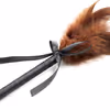 Bow tie with multiple brown feathers