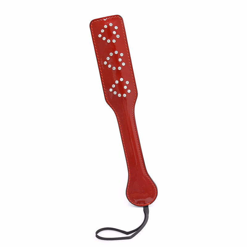 Red patent leather heart-shaped paddle with rhinestones