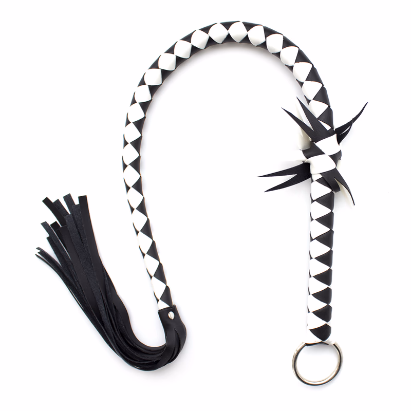 Black and white leather whip