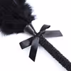 Black bow feather teaser