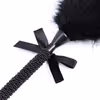 Black bow feather teaser