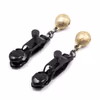 Black and gold trumpet-shaped nipple clamps