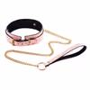 Pink glow-in-the-dark leather neck warmer with bells and chains