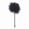 Feather club, black with a small flared tip, total length 27cm