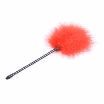 The feather club, with a small red flared tip, is 27cm long.