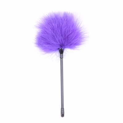 The feathering tool, with a purple flared tip, is 27cm long.